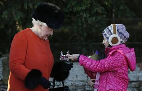 Britain's Queen Elizabeth II received gifts from children in Sandringham, England.

